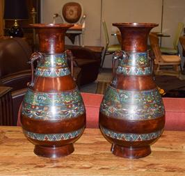 Lot 453 - A pair of modern Chinese bronze and champleve enamel baluster vases with twin elephant mask...