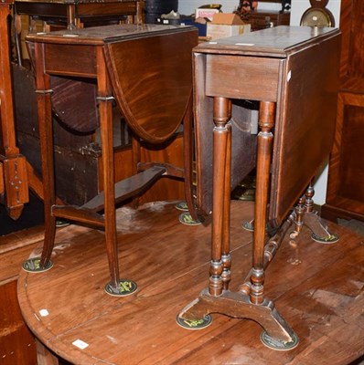 Lot 1195 - A Victorian mahogany Sutherland table inlaid with a fan patera, crossbanded in satinwood, 75cm...