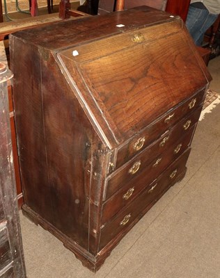 Lot 1200 - A George III oak bureau, 93cm by 50cm by 98cm