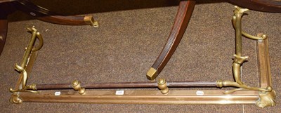 Lot 1228 - An Art Nouveau brass fender, internal measurement 122cm by 30cm, outer 133cm by 37cm