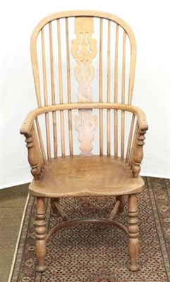 Lot 1246 - A 19th century ash and elm Windsor armchair with crinoline stretcher