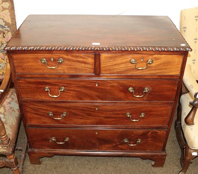 Lot 1258 - Early 19th century mahogany chest of drawers with brass drop handles, 94cm by 49cm by 93cm