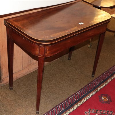 Lot 1261 - A 19th century cross-banded and inlaid mahogany turnover top tea table, 92cm by 45cm by 75cm
