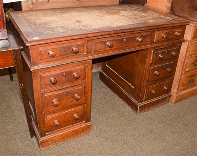 Lot 1267 - An Edwardian mahogany twin pedestal writing desk, 122cm by 69cm by 78cm