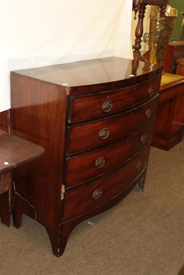 Lot 1278 - An early 19th century mahogany bow-front chest of drawers with brass handles bearing Prince of...