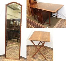 Lot 1290 - An early 20th century gateleg table, 153cm by 90cm, together with a mahogany bedroom wall...