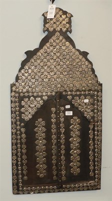 Lot 1302 - A wall mirror in an Islamic influence frame