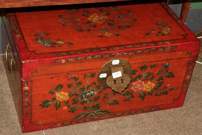 Lot 1307 - A 20th century Chinese lacquered camphor wood chest, with brass clasp 76cm by 53cm by 37cm