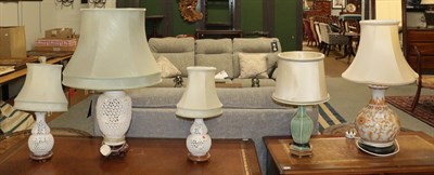 Lot 1337 - Five Chinese based table lamps including a baluster hexagonal celadon example and three pieced...