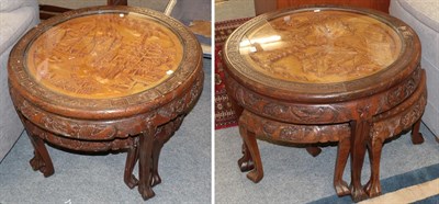 Lot 1338 - A pair of 1930's Chinese nests of tables each comprising one  large circular and four quarter...