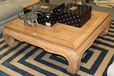 Lot 1339 - A large Chinese style soft wood coffee table, 122cm square by 42cm, together with a blue and...