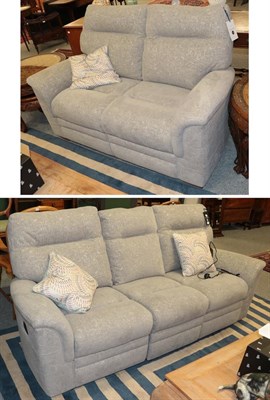 Lot 1340 - A Parker Knoll grey upholstered electric reclining three-seater settee 209cm by 87cm by 98cm...