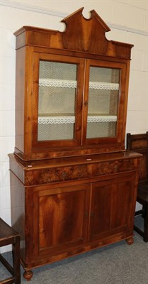 Lot 1345 - A French walnut glazed bookcase cabinet, 120cm by 47cm by 226cm