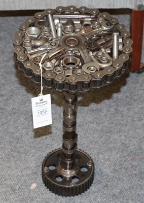 Lot 1355 - A Steampunk Industrial metal tripod table, constructed using various industrial sprockets,...