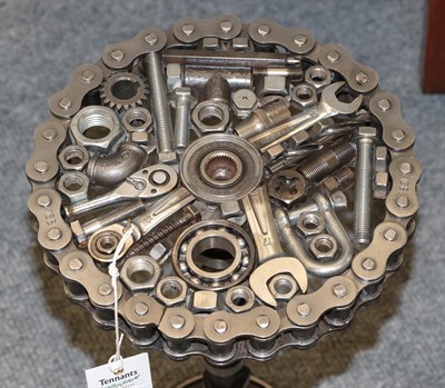Lot 1355 - A Steampunk Industrial metal tripod table, constructed using various industrial sprockets,...