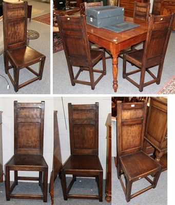 Lot 1360 - A set of eight early 20th century oak panel back dining chairs, 112cm high (8)