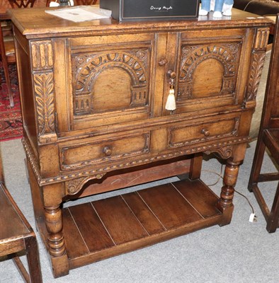 Lot 1361 - A Titchmarsh & Goodwin style oak hutch cabinet, 105cm by 41cm by 114cm