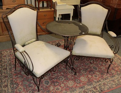 Lot 1364 - A pair of modern metal framed garden armchairs together with a matching table (3)