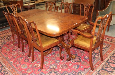 Lot 1374 - A burwood pedestal dining table 210cm by 110cm by 77cm together with a set of eight chairs...