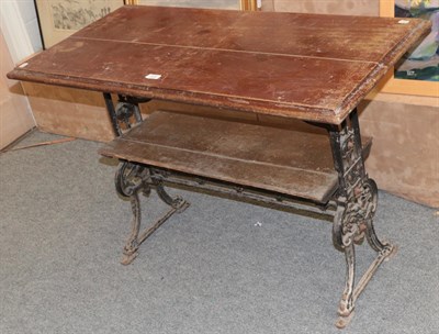 Lot 1375 - A Victorian painted cast iron and timber two-tier table, 101cm by 51cm by 70cm