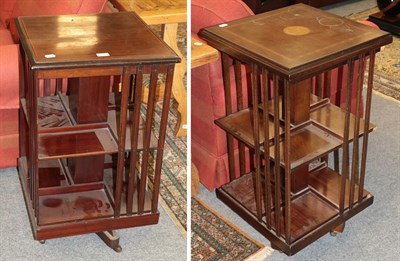 Lot 1387 - Two Edwardian inlaid mahogany revolving bookcases (one a.f.) (2)