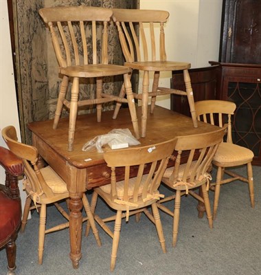 Lot 1394 - A 19th century pine farmhouse table 121cm by 90cm by 77cm with a set of six pine chairs