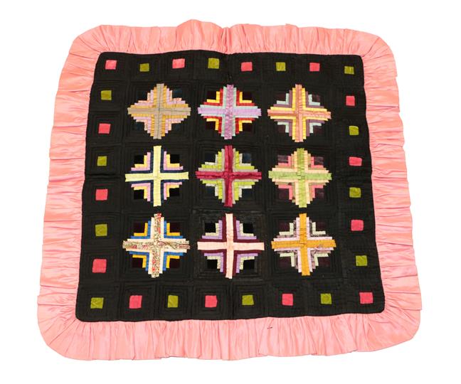 Lot 2009 - An Early 20th Century Decorative Patchwork Cushion Cover/Panel, worked in black, pink and other...