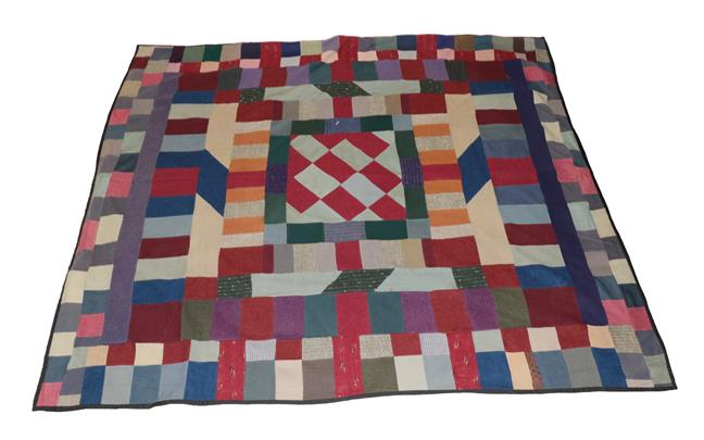 Lot 2012 - Victorian Home Spun Patchwork Bed Cover, incorporating a central block of rectangles with alternate