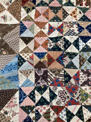 Lot 2015 - A Late 18th Century Patchwork Coverlet, comprising 4cm squares to the centre which are made up...