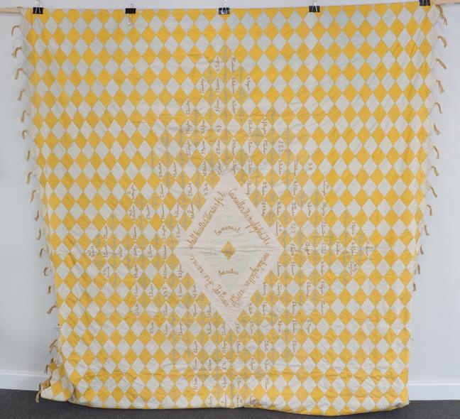 Lot 2017 - A Late 19th Century Decorative Signature Quilt, comprising yellow and white cotton diamond...