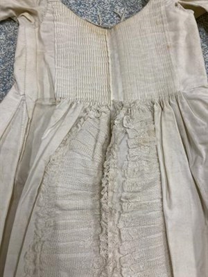 Lot 2028 - Early 19th Century White Cotton Lawn Baby Layette with Hollie Point Lace Insertions, comprising...