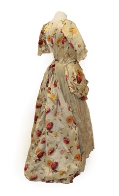 Lot 2048 - A 19th Century Dress printed with large flowerheads in pink and ochre, comprising a fitted...
