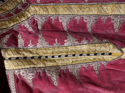 Lot 2051 - Early 20th Century Pink Velvet Eastern Robe, with decorative appliquéd gold trims and stylised...