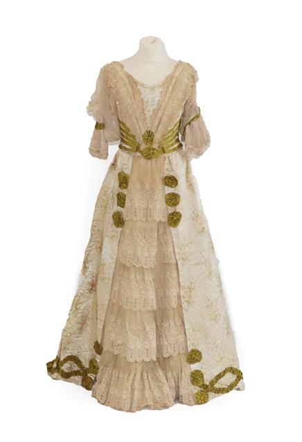 Lot 2056 - A 19th Century Wedding Costume, comprising a fitted bodice in a silk brocade woven with lily of the