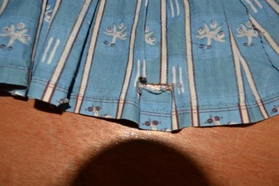 Lot 2065 - Early 19th Century Caraco, in a blue cotton printed with floral and ikat design in alternating...