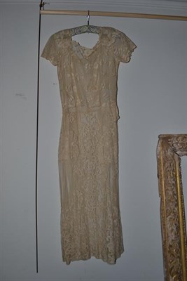 Lot 2071 - Early 20th Century Costume, comprising a lace dress with short sleeves, central panel to the front