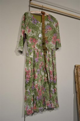 Lot 2080 - Circa 1940 and Later Ladies' Clothing, comprising a black short sleeve dress printed with lambs...