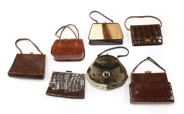 Lot 2109 - Circa 1930 and Later Crocodile and Hide Mounted Handbags, including a Riviera Bag in brown...
