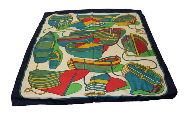 Lot 2137 - Hermès Silk Scarf Thalassa designed by P Peron, with images of rowing boats in primary...