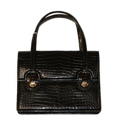 Lot 2142 - Gucci Black Leather Crocodile Handbag, with gilt metal clasp to the front and shaped flap,...