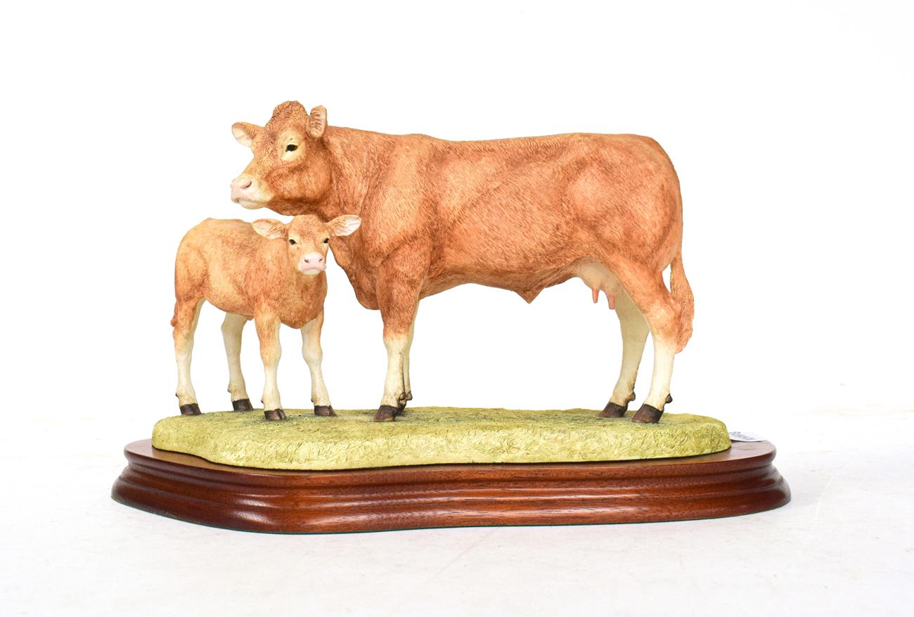Lot 20 - Border Fine Arts 'Blonde D'Aquitaine Cow and Calf', model No. B0353 by Kirsty Armstrong,...