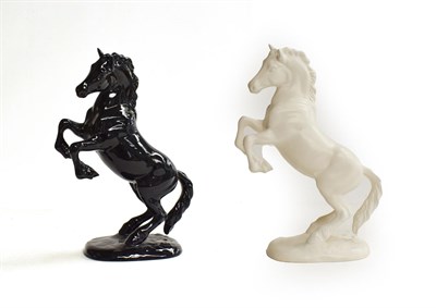 Lot 122 - Beswick Welsh Cob (Rearing), second version, model No. 1014, white matt; together with a black...