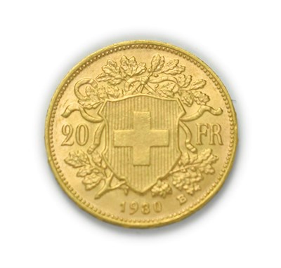 Lot 4082 - Switzerland, 1930 B Twenty Francs. 6.45g of .900 gold. Bern mint. Obv: Bust of young woman from...