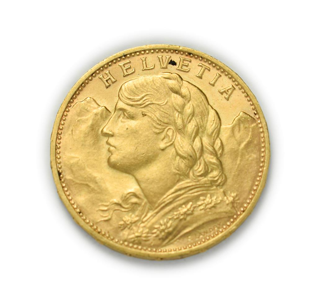 Lot 4085 - Switzerland, 1930 B Twenty Francs. 6.45g of .900 gold. Bern mint. Obv: Bust of young woman from...