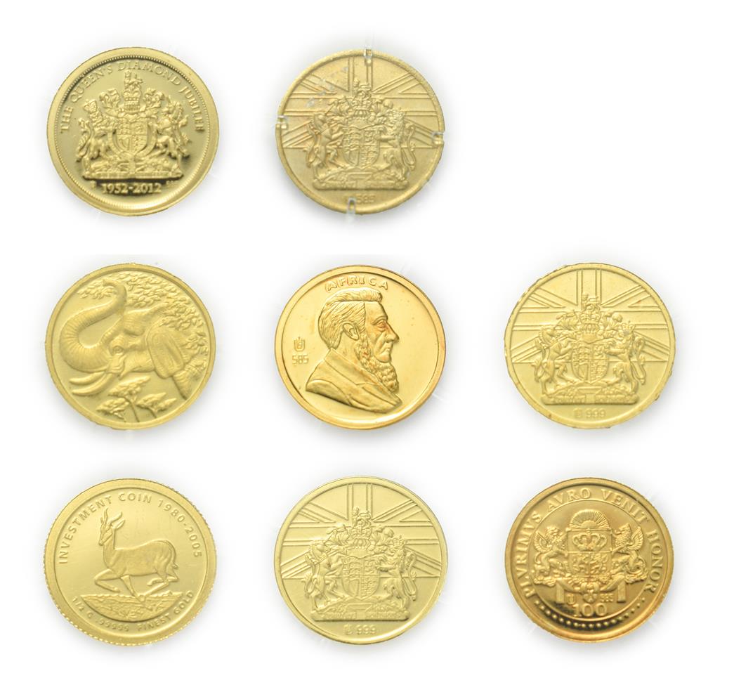 Lot 4095 - A Collection of 8 x World Gold Proof Coins. Each coin is 0.5g of 14ct (.585) gold and struck to...