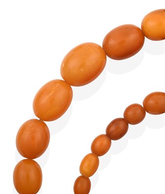 Lot 2011 - An Amber Bead Necklace, formed of twenty-nine graduated amber beads, length 44.5cm see illustration