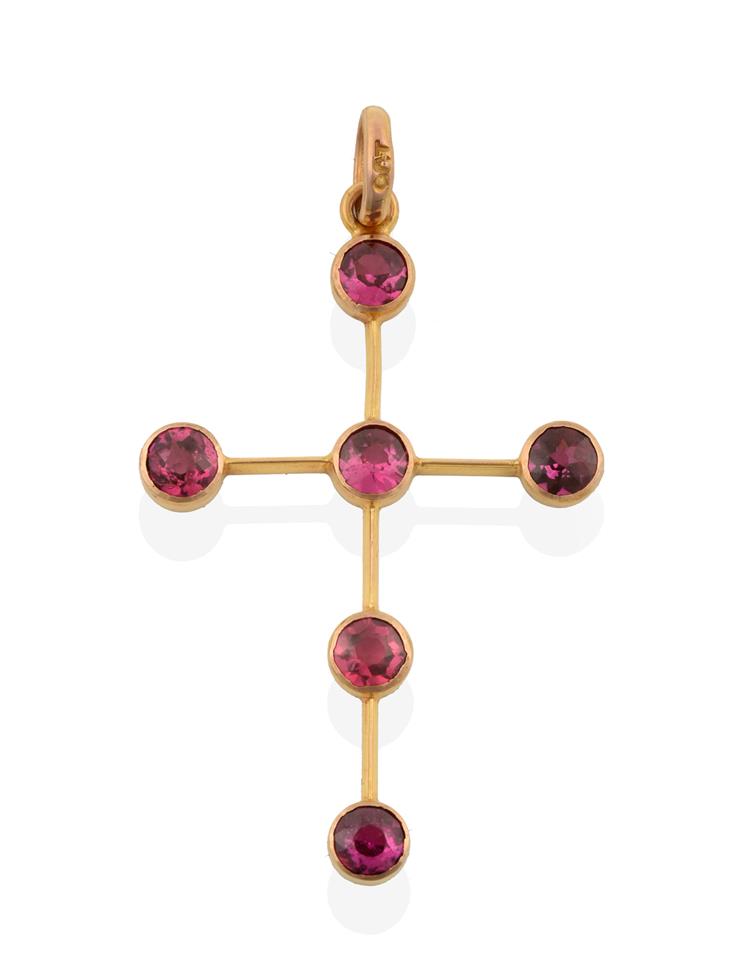 Lot 2026 - A Purplish Pink Stone Cross Pendant, the cross set throughout with six round cut purplish pink...