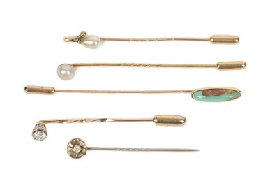 Lot 2034 - A Collection of Five Stickpins, comprising a turquoise example; two cultured pearl examples;...