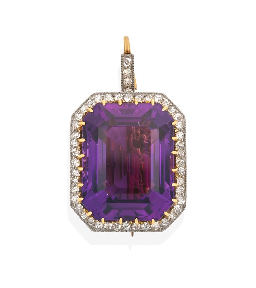Lot 2040 - An Amethyst and Diamond Brooch/Pendant, the emerald-cut amethyst in a yellow claw setting,...