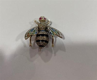 Lot 2043 - An Edwardian Plique-a-Jour Enamel, Ruby and Diamond Bee Brooch, realistically modelled with...